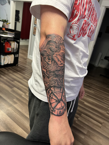 Explore 2 daughters tattoo ideas, creative tattoo ideas in Saint Marys, available at Empire Tattoo