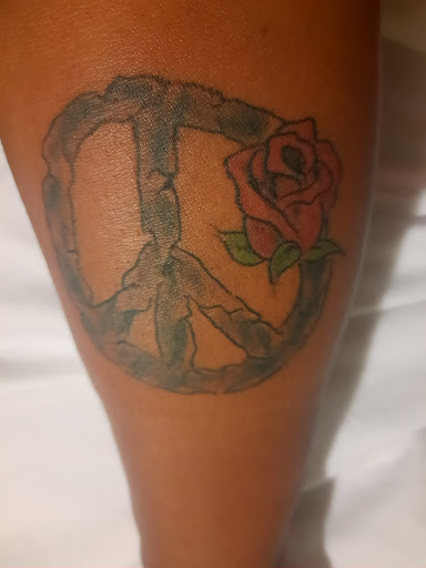 Explore cool cross tattoo ideas, creative tattoo ideas in Savannah, available at Black Lotus Tattoo and Piercing