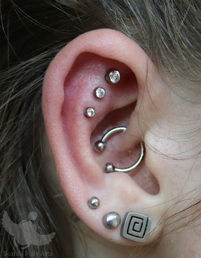 Explore calf tattoo ideas for men, creative tattoo ideas in Syracuse, available at Scarab Body Arts