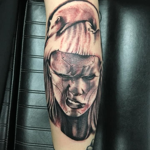 Explore lower back tattoo cover up ideas, creative tattoo ideas in Stevens Point, available at Black Rabbit Tattooing