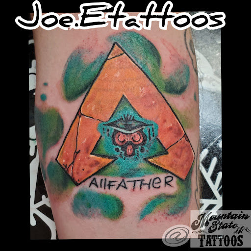 Find small wolf tattoo ideas for your next unique tattoo in Wellsburg at Mountain State Tattoos
