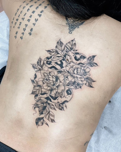 Explore witch hand tattoo ideas, creative tattoo ideas in Charlotte, available at Canvas Tattoo & Art Gallery