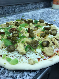 Plats et boissons du Pizzeria Planète Pizza Stains (Achahada) - n°17