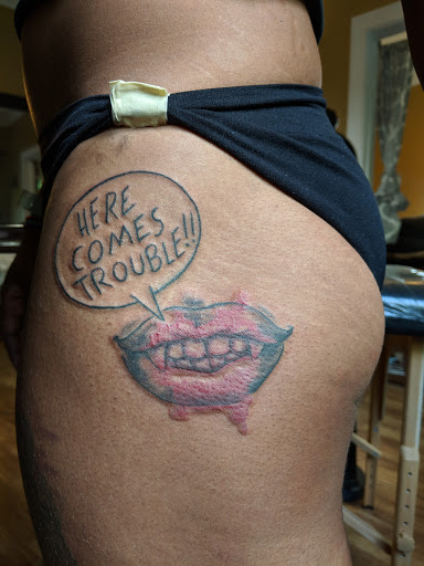 Explore tattoo ideas for guys ribs, creative tattoo ideas in Chapel Hill, available at Golden Falcon Tattoo and Piercing