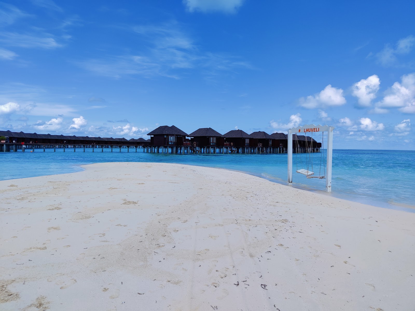 Sun Siyam Olhuveli Plajı'in fotoğrafı ve yerleşim