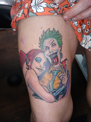 Explore lower back tattoo ideas, creative tattoo ideas in Calhoun, available at Velvet Panther Tattoo and Piercing