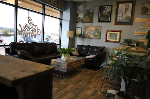 Find tattoo ideas between breast for your next unique tattoo in Seymour at 3 Sevens Tattoo