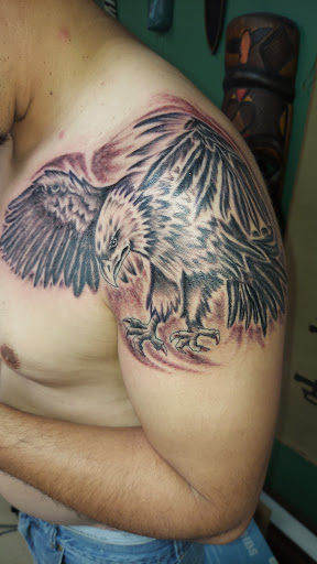 Explore chest tattoo cover up ideas, creative tattoo ideas in Odessa, available at Little Dragon Tattoos Studio