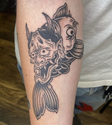 Explore book dragon tattoo ideas, creative tattoo ideas in Baltimore, available at Rippd Canvas Tattoo Shop Artists Social Club