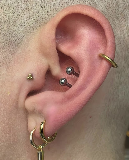 Explore one direction tattoo ideas, creative tattoo ideas in Ypsilanti, available at Michigan Avenue Tattoo & Piercing