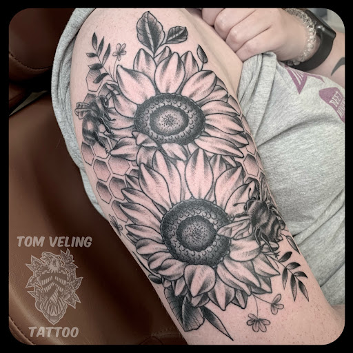 Explore rose and butterfly tattoo ideas, creative tattoo ideas in Orwigsburg, available at Small World Tattoo