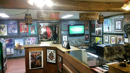 Explore hunting tattoo sleeve ideas, creative tattoo ideas in Butler, available at The Ink Vault