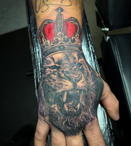 Explore side hand tattoo ideas, creative tattoo ideas in Calhoun, available at Ink Factory Tattoos