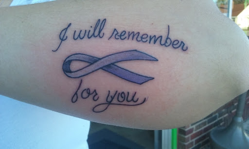 Explore libra scales tattoo ideas, creative tattoo ideas in Decatur, available at Exclusive Ink Tattoos & Body Piercings 22nd & Wood