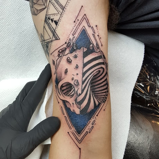 Explore tribal wolf tattoo ideas, creative tattoo ideas in Reno, available at Evolution Tattoo