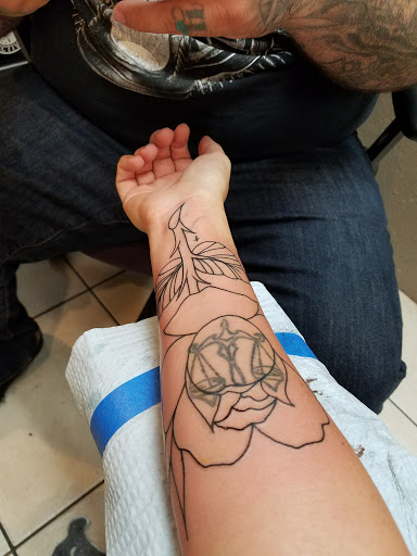 Explore rose sleeve tattoo ideas, creative tattoo ideas in Beaverton, available at Tattoo 42