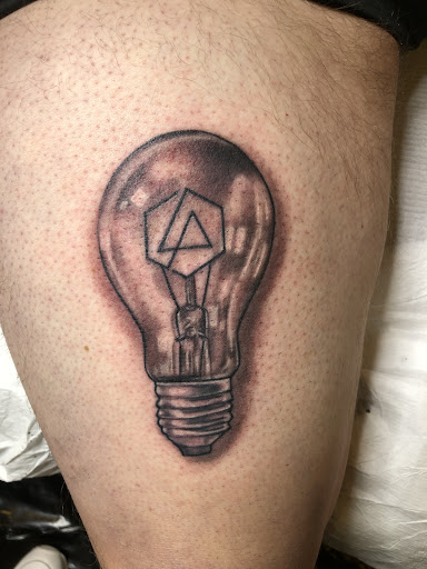 Explore unique side thigh tattoo ideas, creative tattoo ideas in Forney, available at Royal Circle Tattoo studio