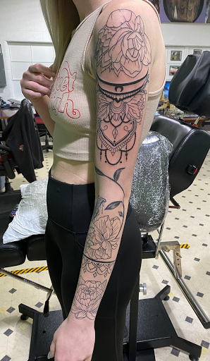 Find dragon tattoo ideas male for your next unique tattoo in Evansville at Ink Therapy 101