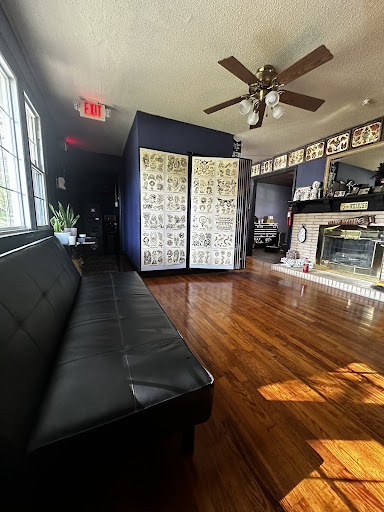 Explore mens elbow tattoo ideas, creative tattoo ideas in Greer, available at Inkslingers Electric Tattooing
