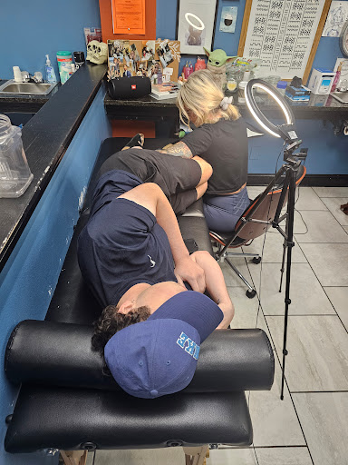 Explore half sleeve flower tattoo ideas, creative tattoo ideas in Foley, available at Symbolic Ink Tattoo Studio