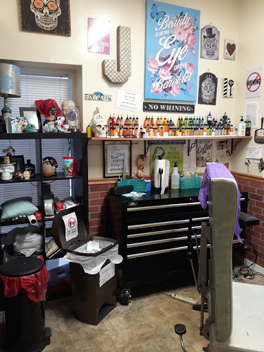 Tattoo Shop «The Lizard Lounge Tattoo Kissimmee», reviews and photos, 4519 S Orange Blossom Trail, Kissimmee, FL 34746, USA