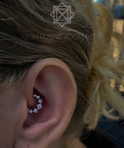 Explore stitch and angel tattoo ideas, creative tattoo ideas in Casper, available at High Plains Adornment