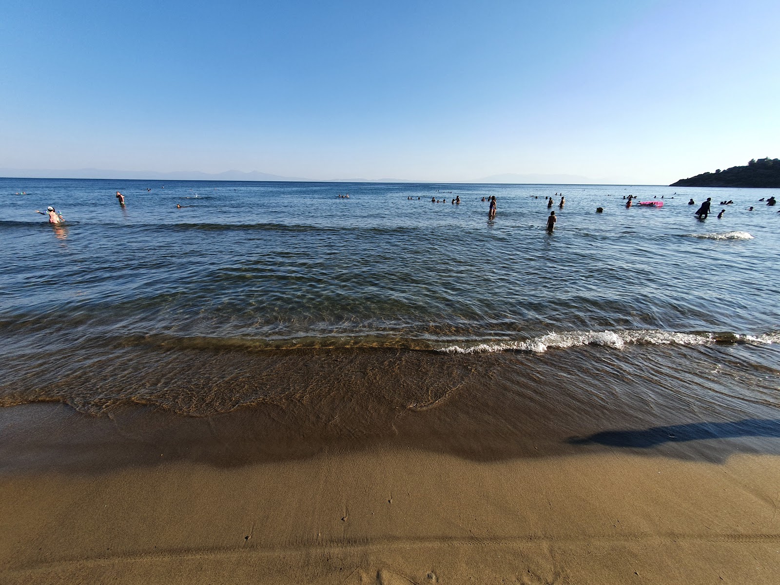 Photo of CukuraltI beach with blue pure water surface