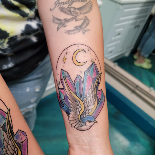 Explore life and death sleeve tattoo ideas, creative tattoo ideas in Traverse City, available at Pinups & Needles