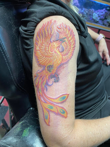 Explore fine line spine tattoo ideas, creative tattoo ideas in Waterloo, available at Eternal Ink Tattoos inc