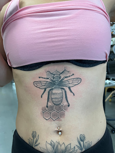 Explore anime hand tattoo ideas, creative tattoo ideas in Modesto, available at Ink Disciples Tattoo Parlor