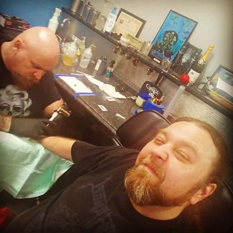 Find small tattoo between breast ideas for your next unique tattoo in Amityville at Tattoo Frenzy Inc