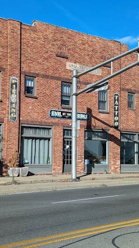 Explore upper back tattoo ideas male, creative tattoo ideas in Bloomington, available at Evil by the Needle Custom Tattoo and Piercing Studio