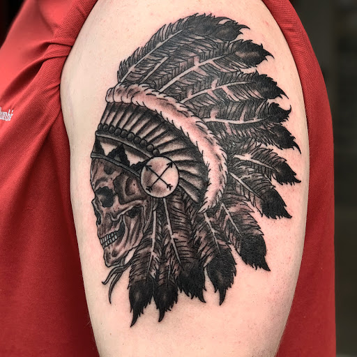 Find charm bracelet tattoo ideas for your next unique tattoo in Jonesboro at Gallery Of Ink Tattoo Shop