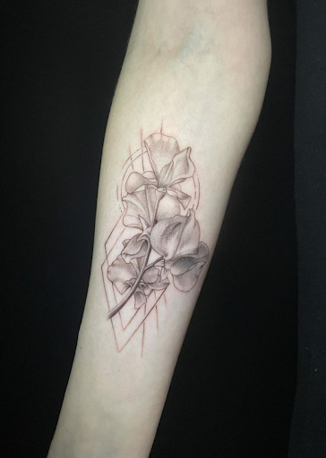 Explore sternum tattoo ideas for females, creative tattoo ideas in Charlotte, available at Canvas Tattoo & Art Gallery