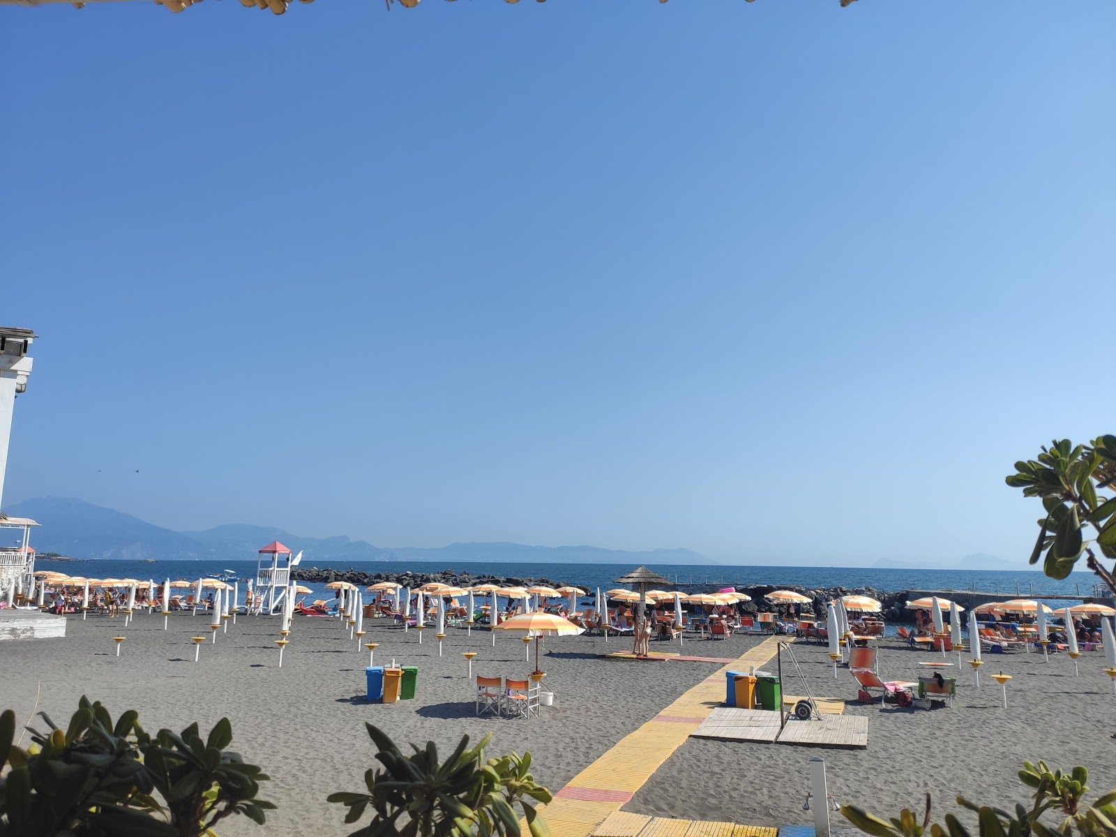 Spiaggia delle Mortelle II的照片 带有蓝色的水表面