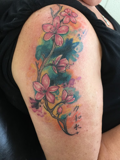 Explore arrow tattoo ideas, creative tattoo ideas in Sarasota, available at SEVEN SINS Tattoo Studio