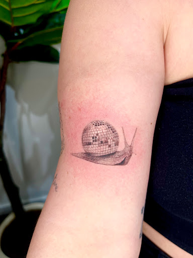 Explore hitchhiker's guide to the galaxy tattoo ideas, creative tattoo ideas in Brooklyn, available at ninistattoostudio