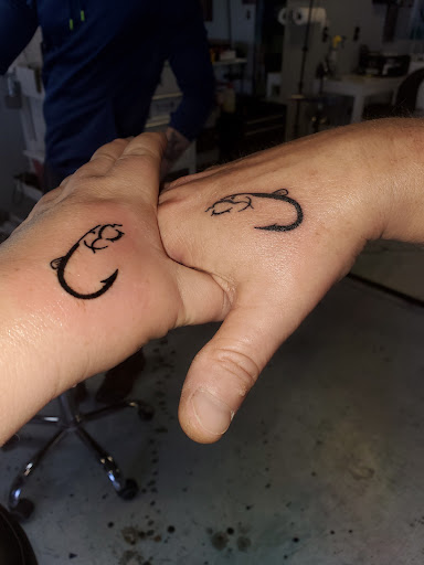 Explore single flower tattoo ideas, creative tattoo ideas in Loogootee, available at The Inkspot Tattoo Shop LLC