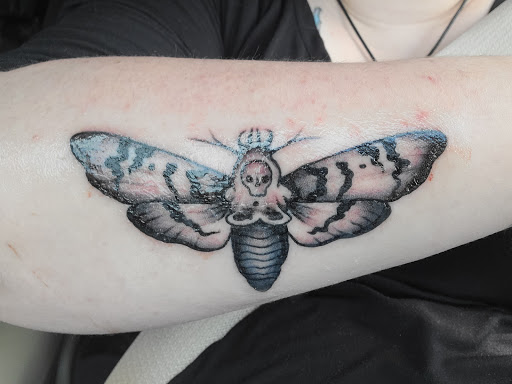 Explore women's leg tattoo ideas, creative tattoo ideas in Waynesboro, available at Tattooed In the Wild Studio