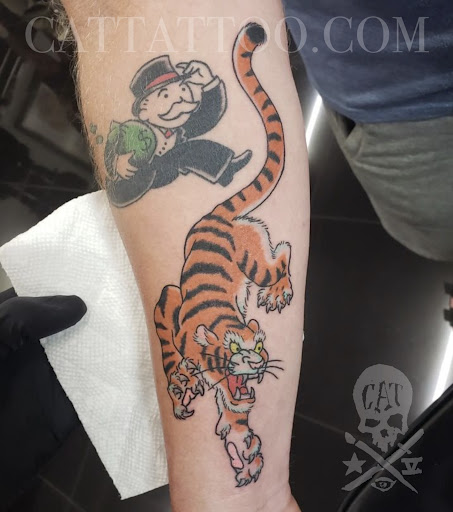 Explore biceps tattoo ideas, creative tattoo ideas in Addison, available at Cat Tattoo