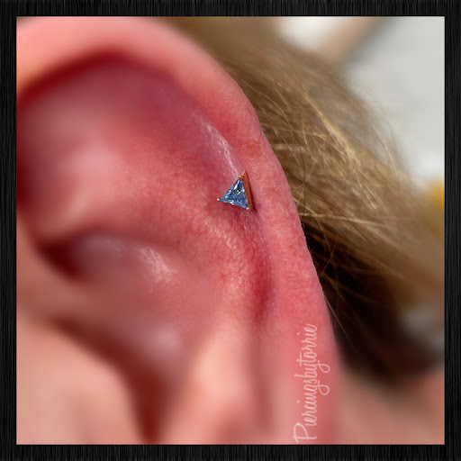 Find tattoo ideas for in between breast for your next unique tattoo in Fort Walton Beach at Piercings by Torrie