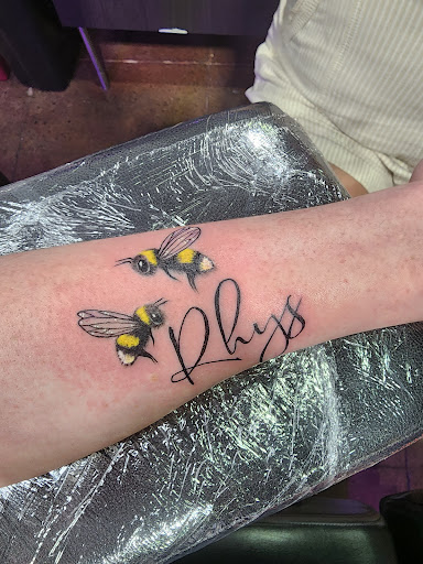 Explore toy story tattoo ideas, creative tattoo ideas in Englewood, available at 7 Souls Tattoo and Body Piercing Studio