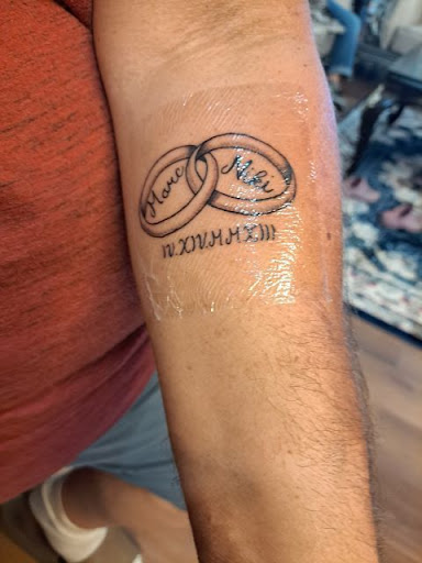 Explore knee ditch tattoo ideas, creative tattoo ideas in Brandon, available at Forever Yours Tattoo and Piercing