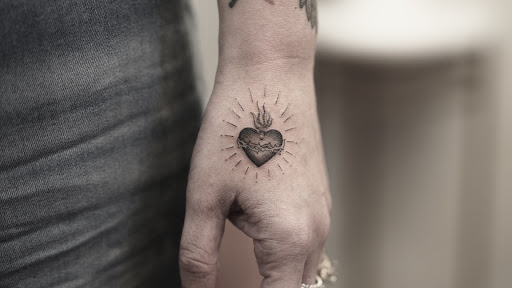 Explore black tattoo ideas for men, creative tattoo ideas in Saint Johns, available at Flamingo Ink