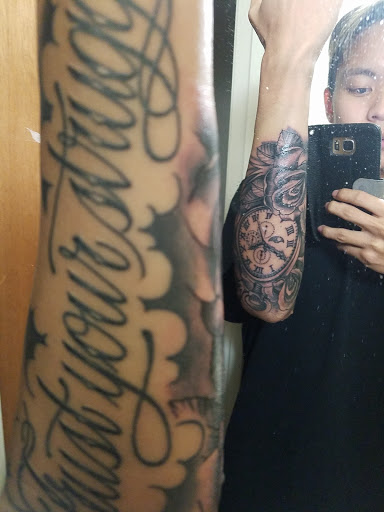 Explore roman catholic tattoo ideas, creative tattoo ideas in Saint Augustine, available at Ms. Deborahs Fountain of Youth Tattoo & Body Piercing