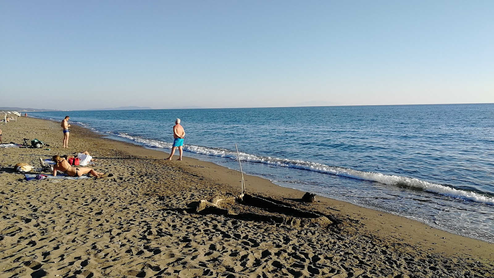 Foto di Palone beach con una superficie del acqua blu