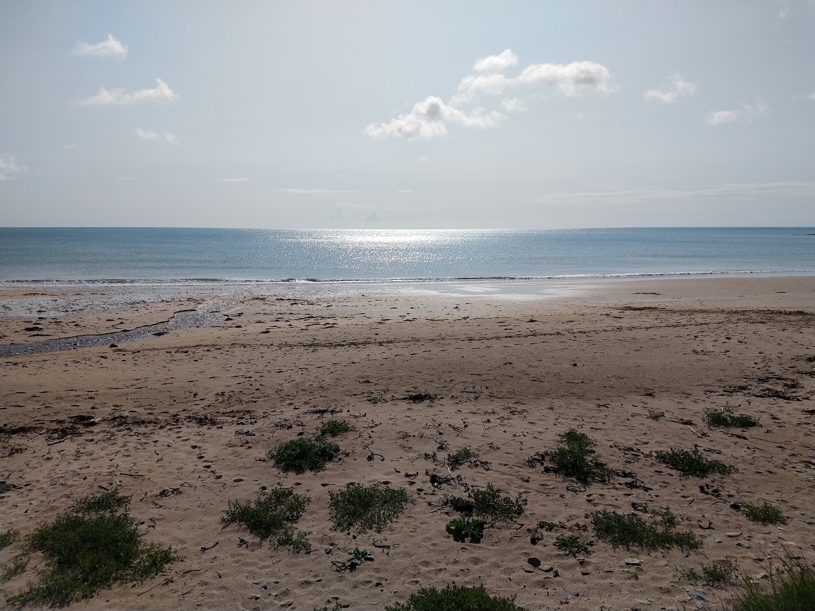Foto av Crushea Bay Beach med turkos rent vatten yta