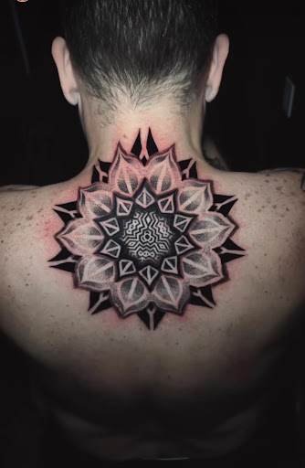 Find background tattoo ideas for guys for your next unique tattoo in Charlotte at Canvas Tattoo & Art Gallery