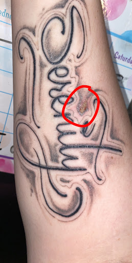 Tattoo Shop «Express Yourself Tattoos & Body Piercing», reviews and photos, 1101 Ridge Rd, Lackawanna, NY 14218, USA