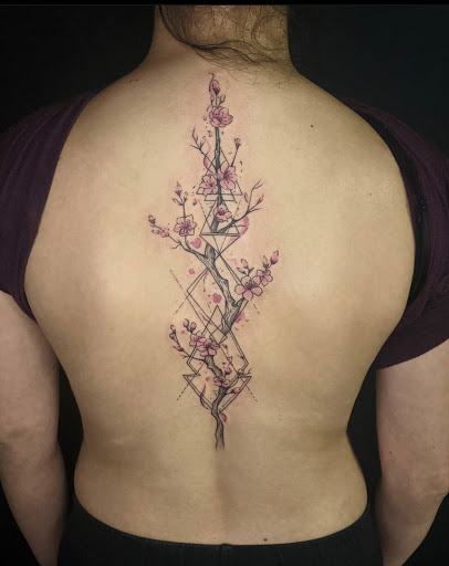 Explore middle neck tattoo ideas, creative tattoo ideas in Charlotte, available at Canvas Tattoo & Art Gallery